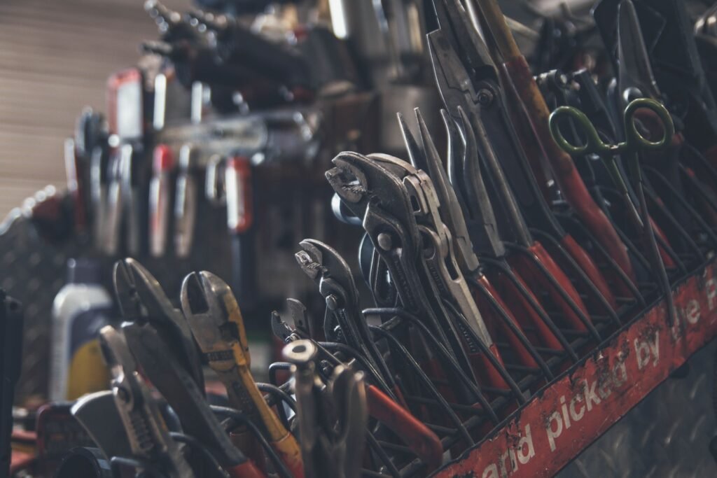 Now Air Conditioining Emergency Air Conditioning and Heating Services. An image of a variety of tools in a toolbox.